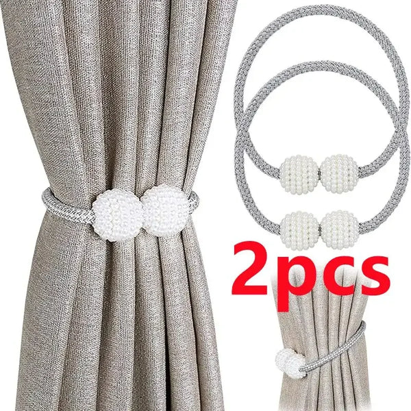 Silver pearl magnetic curtain clips with two sets of round clips shown against a gray fabric backdrop