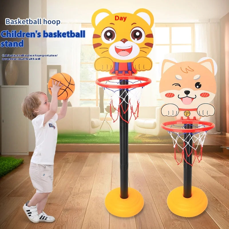 A yellow cartoon tiger-themed basketball hoop stand with a net and an orange basketball, shown in a living room setting.