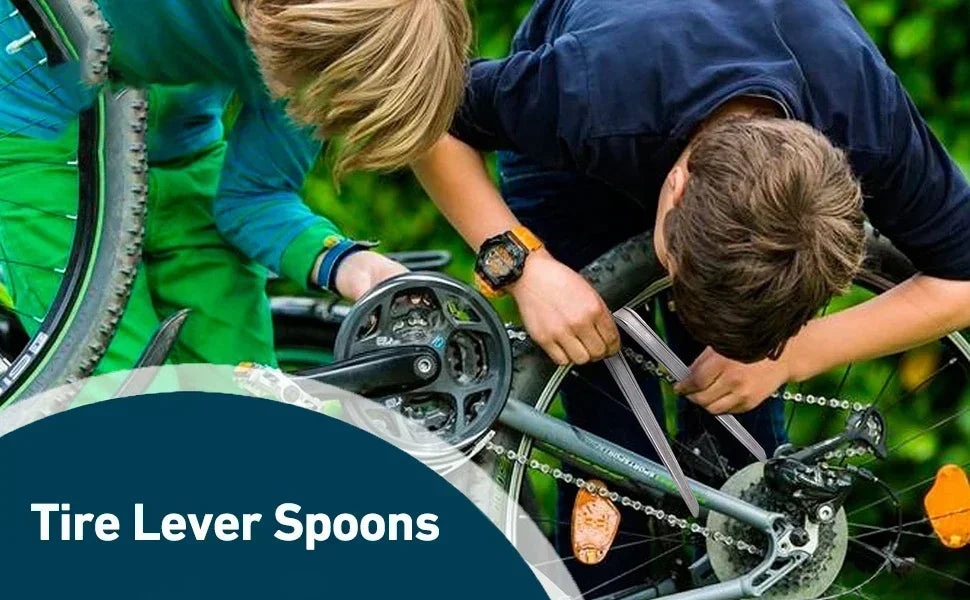 A child is using a tire lever spoon on a bicycle wheel.