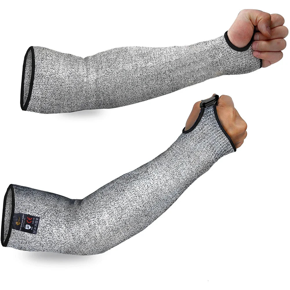 A hand is wearing a long-sleeved, gray cut-resistant arm sleeve for industrial safety.