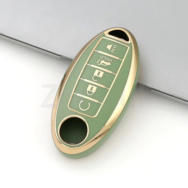 A green and gold TPU car key case cover with multiple buttons for Nissan and Infiniti models.
