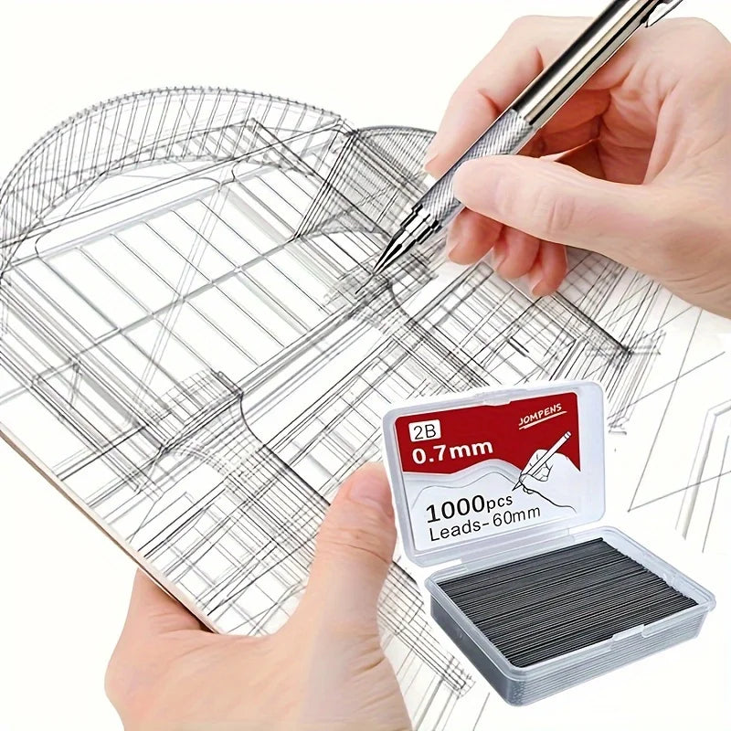A hand is using a mechanical pencil to draw on a transparent sheet of graph paper next to a box of 1000 pencils.