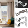 A set of metal curtain rod brackets for 1-inch rods shown in various angles.