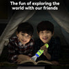 Two young boys smiling while exploring a story with an educational projector flashlight.