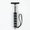 A black retractable car mirror and window cleaning wiper with a silver shaft and black cord.