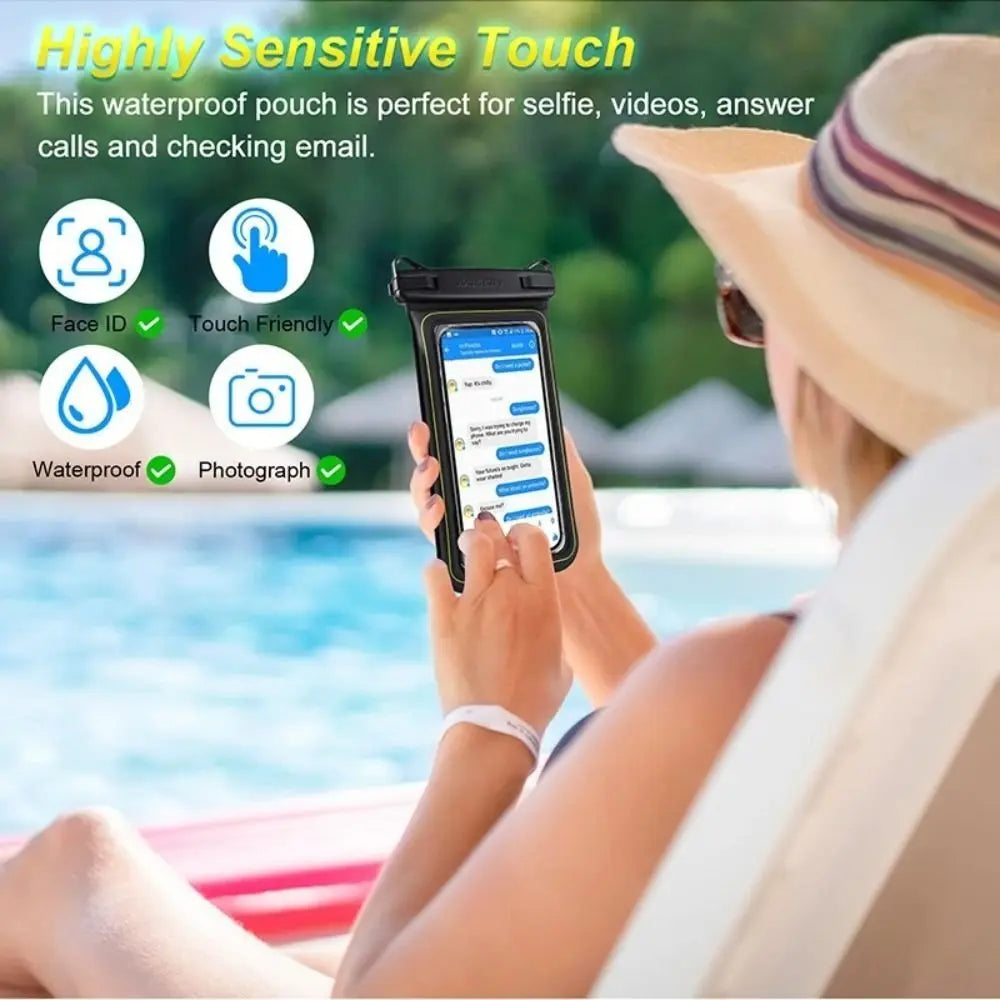 A woman is using a waterproof floating phone case with a detachable strap to take a selfie or video near water.