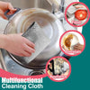 A hand is using a multifunctional cleaning cloth inside a stainless steel pot for kitchen cleaning.