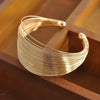 Gold Geometric Twist Cuff Bracelets