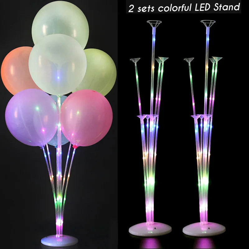 Two sets of colorful LED stand balloons used for party decor