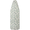 A long, oval ironing board cover patterned with small white and orange daisies on a light gray background.