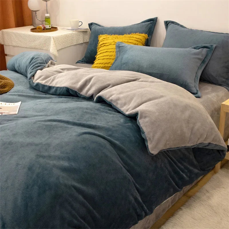 A dark blue flannel duvet cover with a zipper, displayed on a bed with matching pillows and yellow accents.
