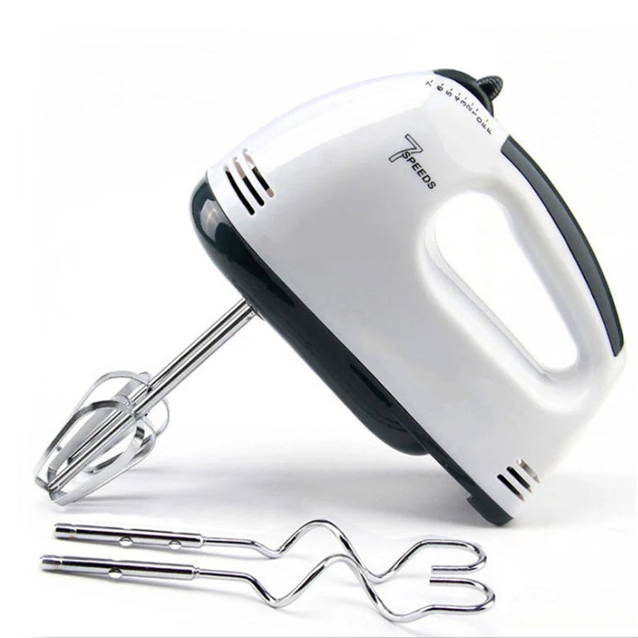 A white 7-speed handheld electric mixer with a whisk attachment and two metal piping tools.
