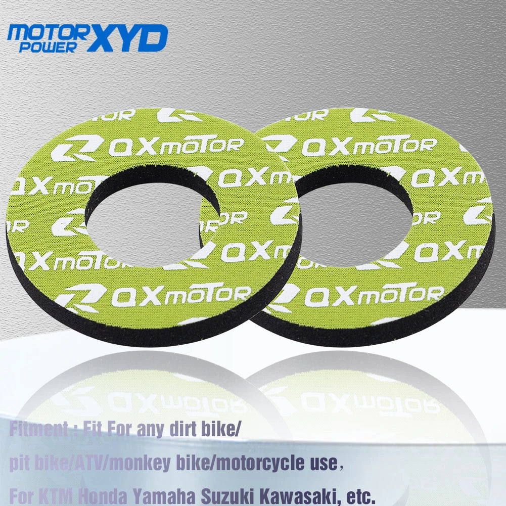 A pair of olive green and black universal dirt bike handlebar grips for various motorcycles.