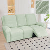 A light green heavy-duty linen stretch sofa cover for recliners lying on a rug.