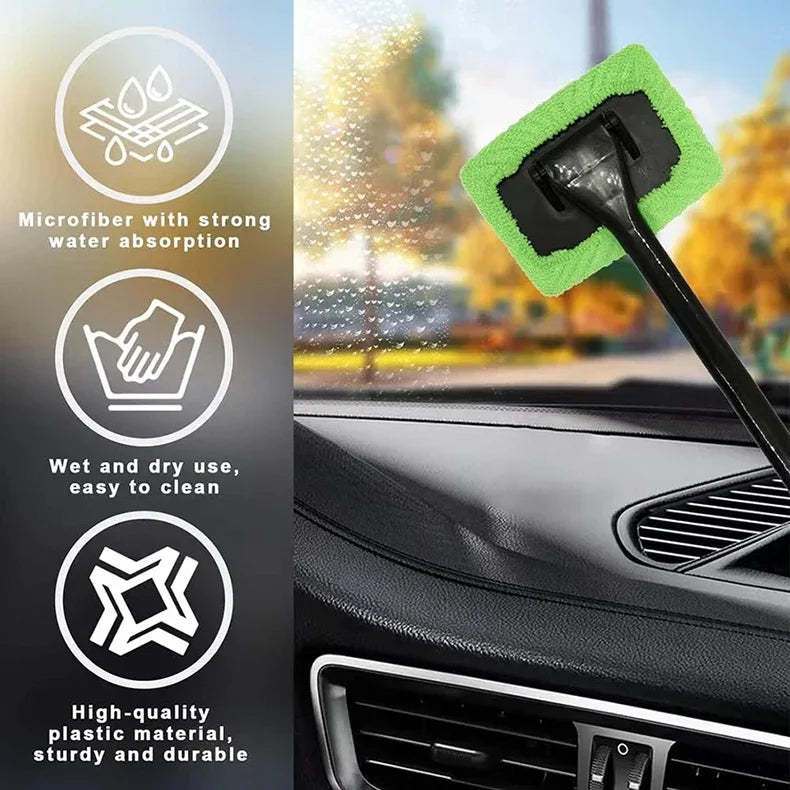 A green microfiber cleaning brush is shown being used to clean a car's interior windshield.