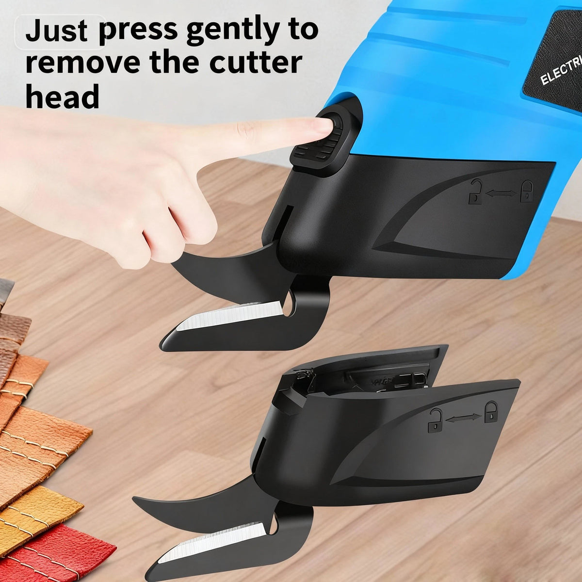A hand gently presses to remove the cutter head from a blue electric scissor tool.