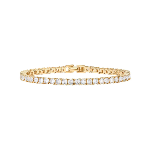 A delicate 14K gold plated tennis bracelet featuring round diamonds.