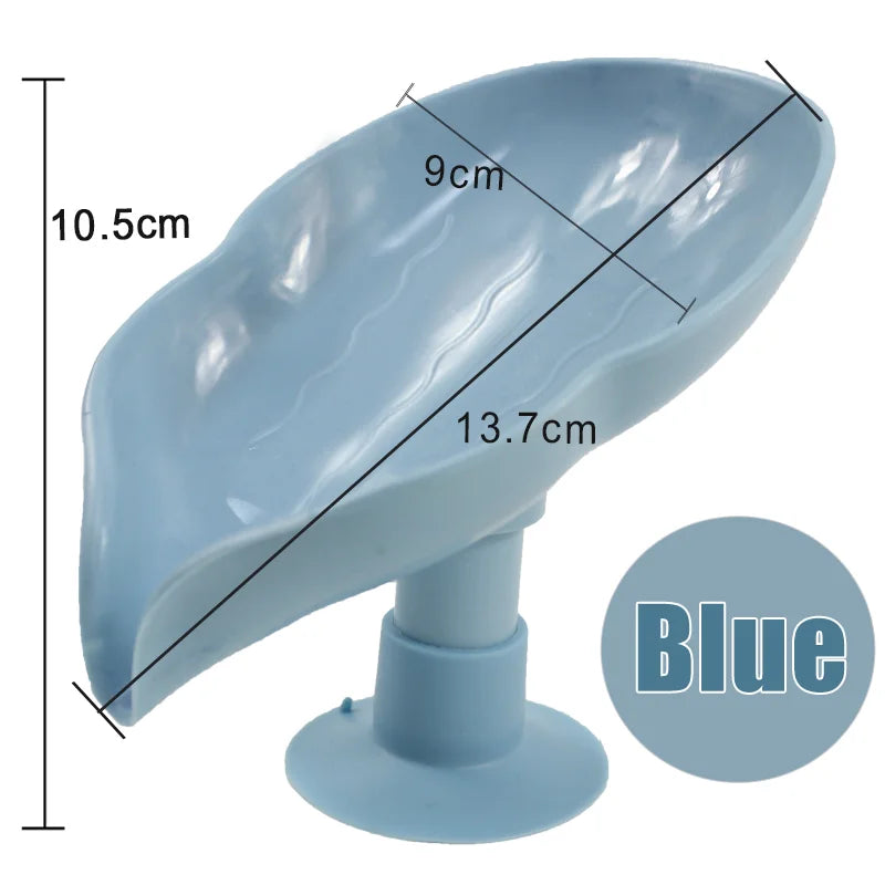 A blue leaf-shaped suction cup soap dish with a self-draining tray shown from the side.