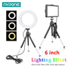 A 6 inch RGB LED video light panel with a tripod and remote control for lighting effects.