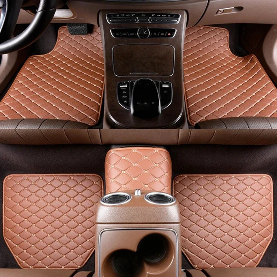 A set of five brown quilted PU leather car floor mats installed in a vehicle interior.