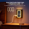A smart wall outlet night light with three brightness levels illuminating a power strip on a wooden surface.