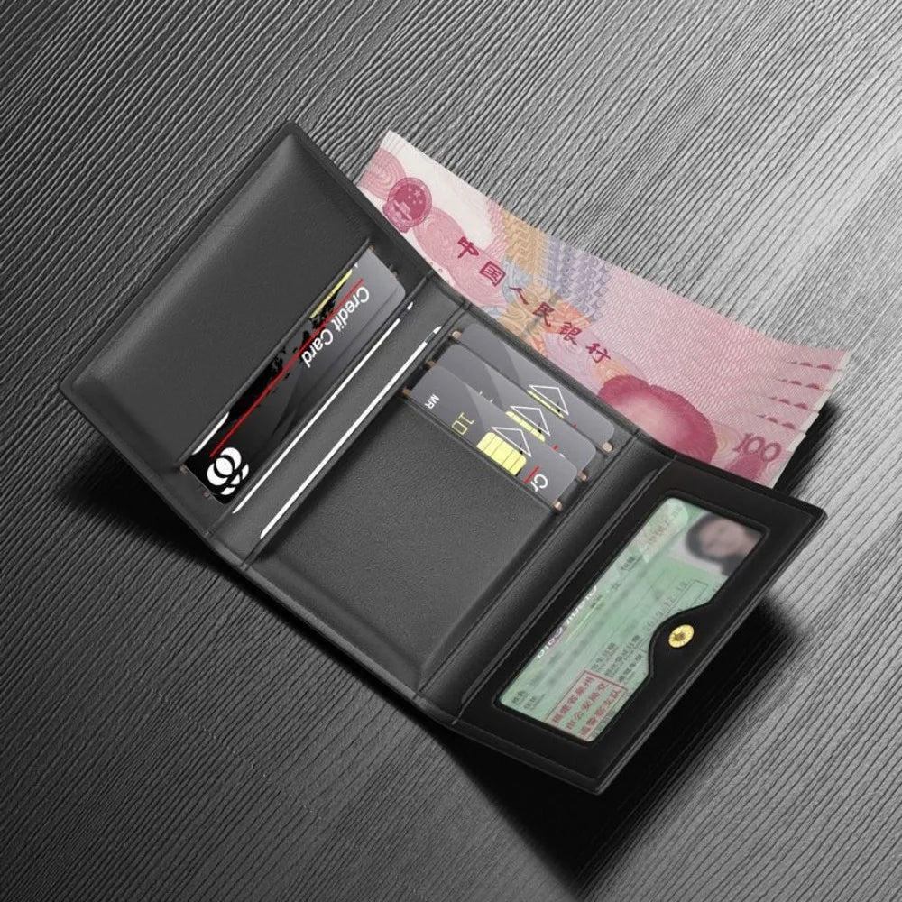 A black leather card holder wallet displaying various credit cards and a banknote on a dark gray surface.