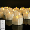 A row of glowing white LED tea light candles are displayed on a dark surface with a remote control visible.