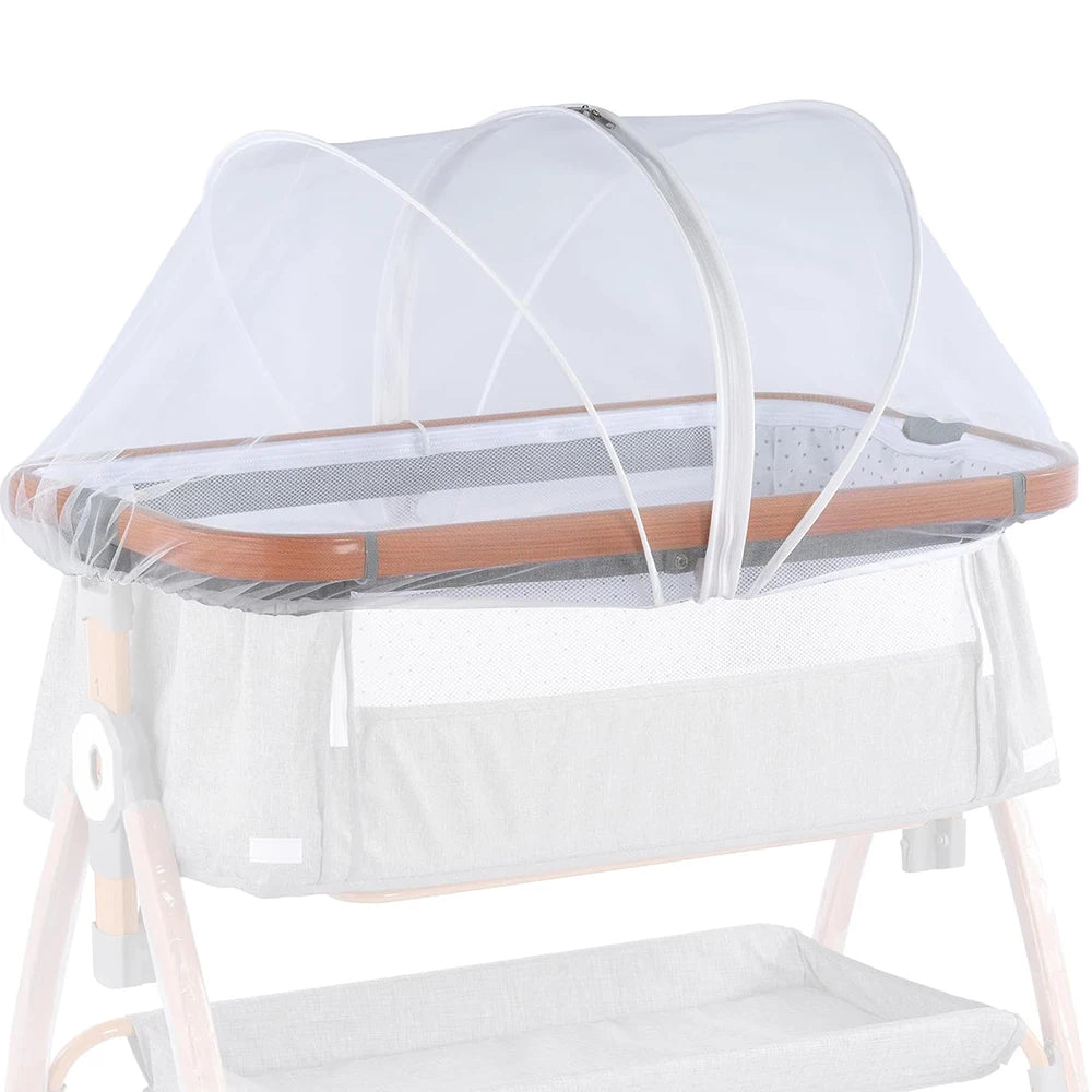 A white mosquito net cover for a baby bassinet or crib, shown resting on a wooden frame.