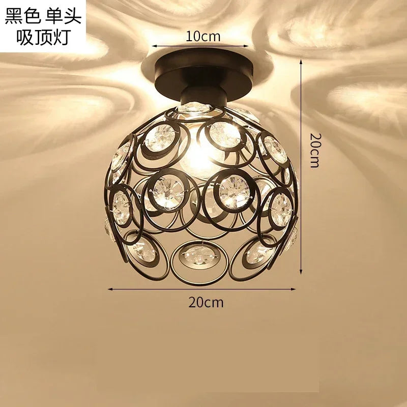 A black crystal single-head ceiling lamp with a metal frame, featuring multiple clear glass bulbs.