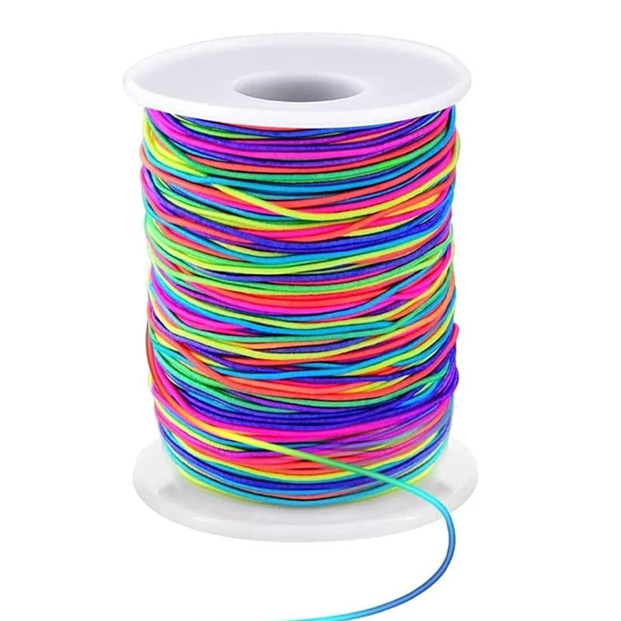 A spool of multicolored 1mm elastic stretchy cord for jewelry making
