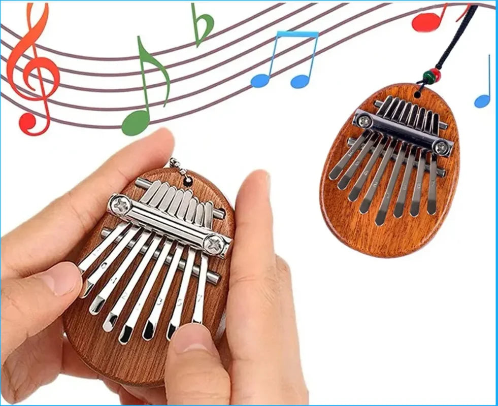 A hand holds a wooden kalimba thumb piano with metal tines, set against musical staff lines.