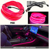 Pink flexible USB LED neon strip ambient lighting installed in a car interior dashboard.
