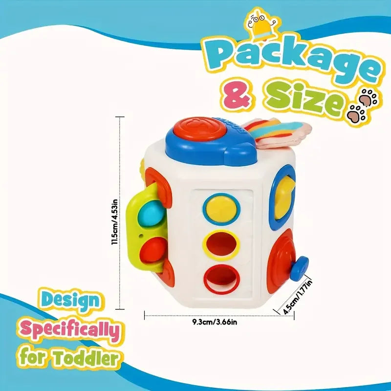 A white sensory learning cube toy for toddlers featuring colorful buttons and a top piece.
