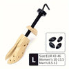 Adjustable wooden shoe stretcher tool with a black handle and wooden sole for men's and women's feet.