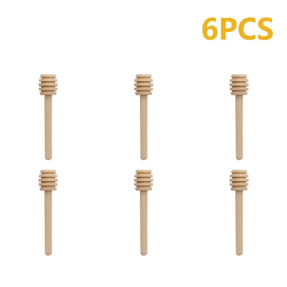 Six natural wood honey dipper sticks shown individually against a white background.
