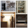A collection of interior shots showing a modern kitchen cabinet, a closet shelf, and a bedroom with under-bed lighting.