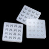 White epoxy resin mold with butterfly shapes for DIY jewelry making