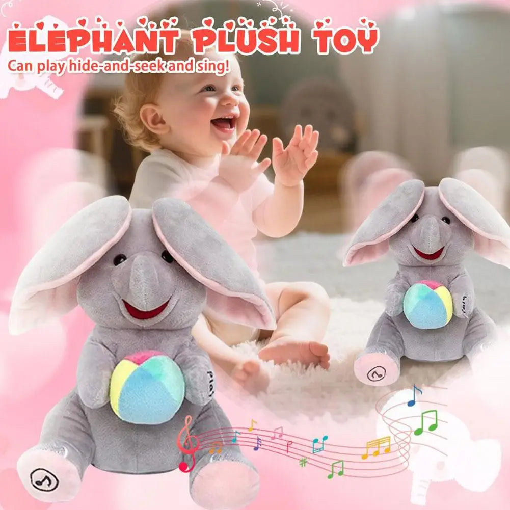 A gray elephant plush toy is shown with musical notes, being played by a smiling baby in a soft pink setting.