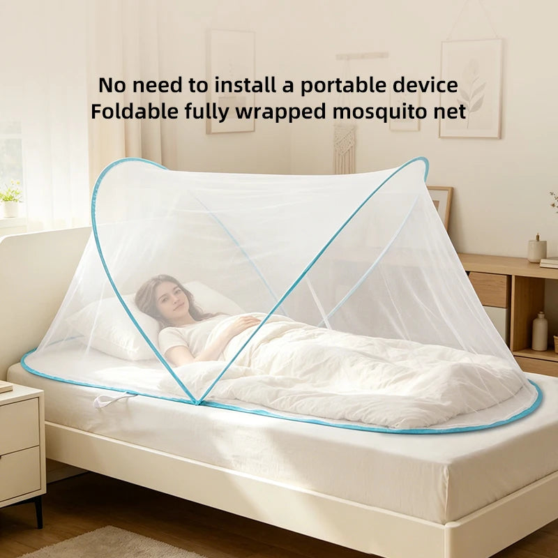 A woman is sleeping under a fully wrapped, foldable mosquito net over her bed.