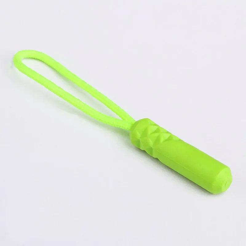 A bright lime green replacement zipper pull with a nylon cord and textured grip.
