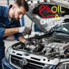 A mechanic performs an oil change on a car engine, with a neon sign graphic overlay reading OIL CHANGE.
