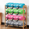 A wooden shelf displaying various colored foldable nylon shoe storage bags for waterproof protection.