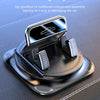 A close-up view of a 360 degree rotating car dashboard phone mount with an anti-slip silicone base.