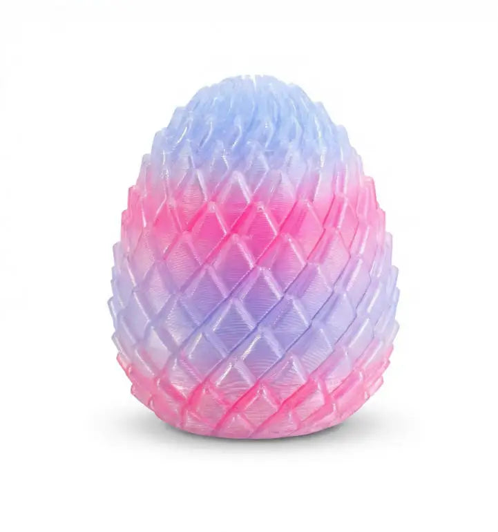 A brightly colored, textured fidget egg toy with a gradient of pink and purple.