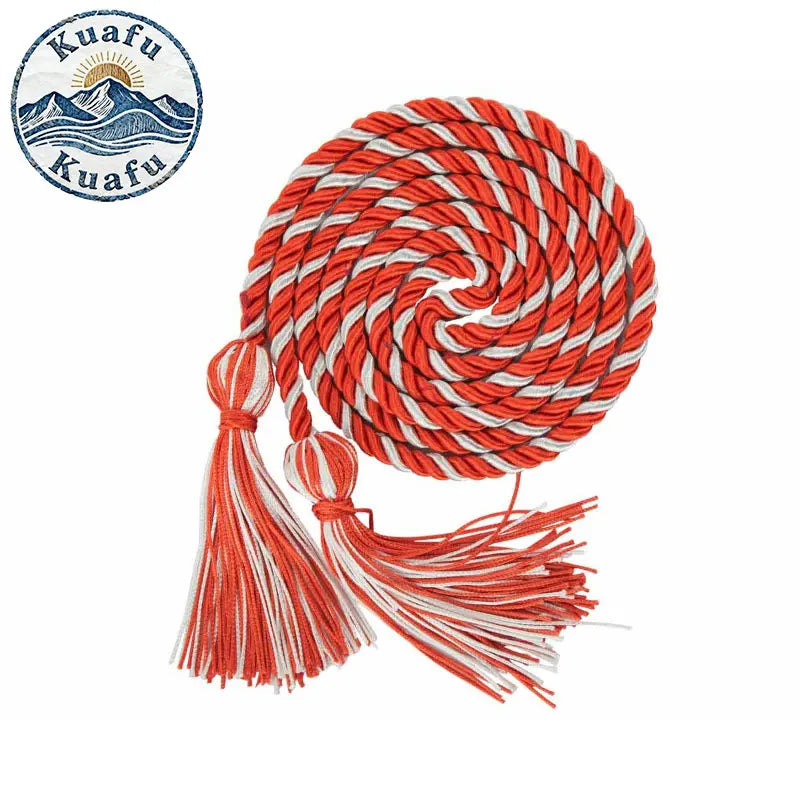 A ball of orange and white graduation honor cords with double fringe tassels.