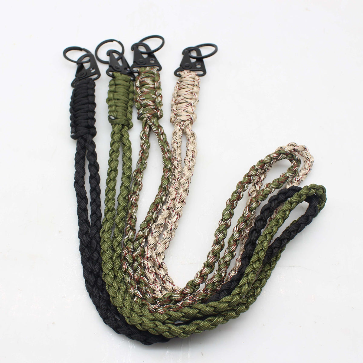 Paracord lanyard keychain with zinc alloy clip in black, olive green, and beige colors