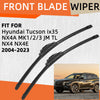 A set of two black front blade wipers for a Hyundai Tucson, shown against an orange background.