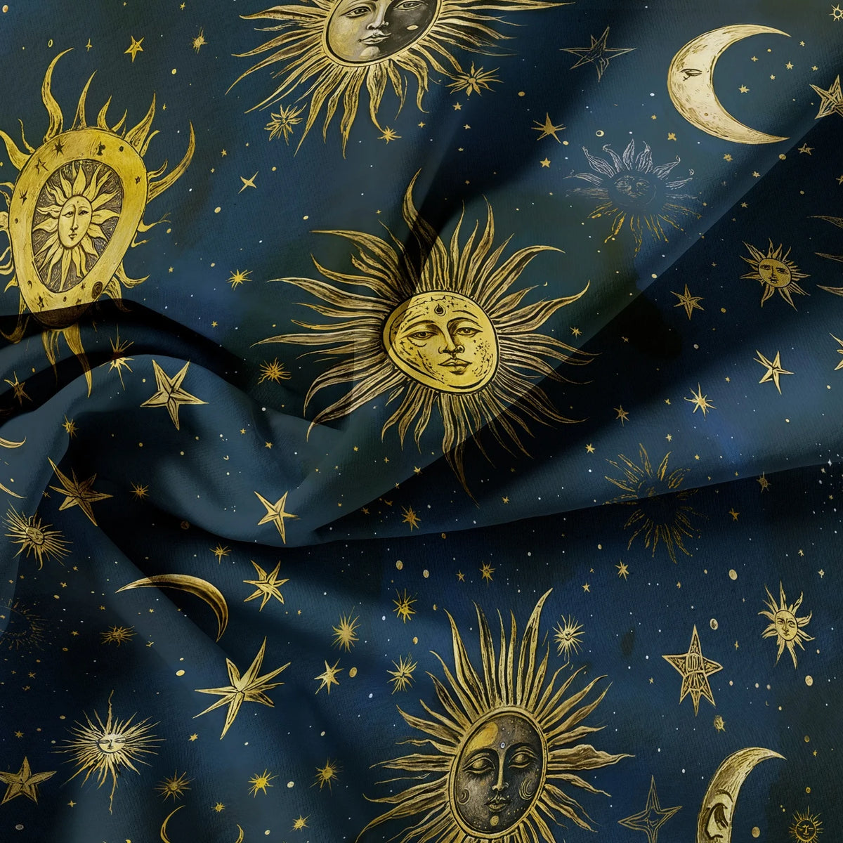 Dark blue fabric featuring gold celestial designs of the sun, moon, and stars.