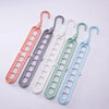 Rotating 9-Hole Folding Clothes Hanger Organizer for Space-Saving Wardrobes