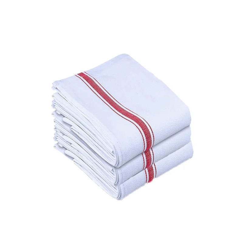 A stack of white cotton kitchen towels with red stripes.